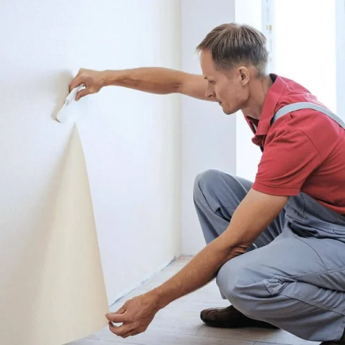 How to stick paper on the wall without damaging paint